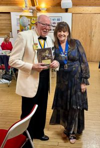 Vic receiving his plaque for services to Lions Image