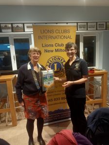 President Alex presenting me with their new banner
